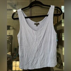 Light blue tank top with a v neck - perfect for a casual look!